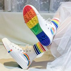 Stylish Rainbow Print High Top Canvas Shoes Elevate your style with our Stylish Rainbow Print High Top Canvas Shoes. These eye-catching shoes feature a unique rainbow print that will make you stand out from the crowd. Made with high-quality canvas, they offer both style and comfort for any occasion. Upgrade your shoe game today. All measurements are approximate and can vary slightly. Please check size info. before order. Clown Clothing, Sally Starlet, Kidcore Outfit, Kawaii Swimsuit, Dark Academia Clothing, Anime Lingerie, Aesthetic Dark Academia, 40 Women, Spring Summer Autumn Winter