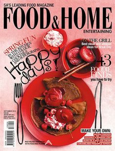 the cover of food and home magazine with red plated food on it's side