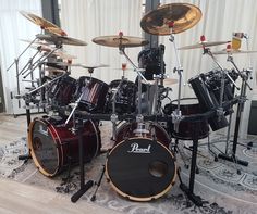 a drum set sitting on top of a rug