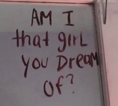 graffiti written on the side of a building that says, am i that girl you dream off?