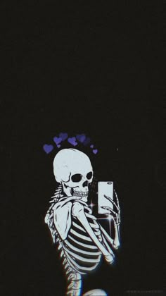 a skeleton holding a cell phone up to its face with hearts flying out of it