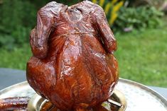 a large piece of meat sitting on top of a metal pan