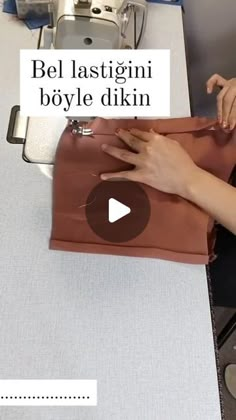 a woman is working on a bag at a sewing machine with the words bel lastigini boyle dikin