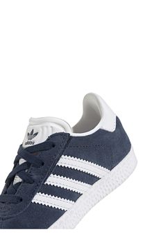 Initially designed in '91 as a training shoe for top athletes, the iconic Gazelle sneaker has been refreshed with stretchy laces for your little athlete. Pull-on style with elastic laces Removable insole Leather or leather and synthetic upper/textile lining/rubber sole Imported Adidas Kids, Elastic Laces, Training Shoes, Navy White, Navy And White, Rubber Sole, Nordstrom, Adidas, Elastic