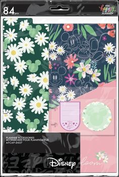 the disney mouse paper pad is shown with flowers and mickey mouses on it's side