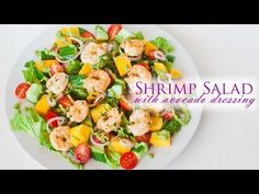 shrimp salad with avocado dressing on a white plate and the words shrimp salad