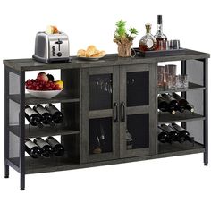 an entertainment center with wine bottles and glasses on the top shelf, along with other items