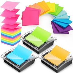 several different colored sticky notes on top of each other