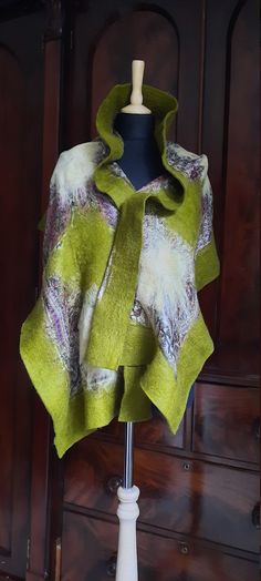 Each piece a fabulous and unique work of art handcrafted in Turkey.  100% Merino Wool felted onto beautifully printed silk creating a stand-out scarf that can add drama to any outfit. Due to the handmade nature of this item measurements are a rough guide. Artistic Hand-dyed Green Scarves, Felt Board, Felted Scarves, Nuno Felting, Printed Silk, Felted Wool, Felt Art, Silk Printing, Silk Scarf