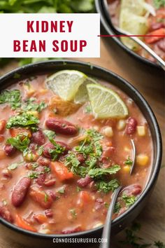 a bowl of kidney bean soup with cilantro and limes on the side