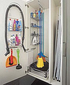 the inside of a closet with various cleaning supplies