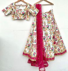 This is a Lehenga choli for women ready to wear Indian wedding party wear. Kids lehenga set is made for girl kids upto the age of 7 years. I make it exclusively for my customers by using designer fabrics. I will only start making it after you confirm your required size details. Handling time: Don't worry, just tell me, I will process it accordingly and deliver on or before a delivery date you mention. Size: This is custom made as per your size. Post your order I will send you a measuremnts refer Fitted Bollywood Dresses With Motifs, Fitted Floor-length Dresses With Motifs, Fitted Art Silk Sharara With Motifs, Fitted Bollywood Lehenga With Motifs, Fitted Dresses With Motifs For Navratri, Fitted Dress With Motifs For Festive Season, Fitted Lehenga With Motifs, Fitted Dress With Motifs For Festivals, Bollywood Style Designer Cotton Lehenga