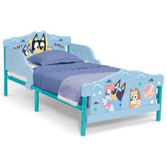 a child's bed with cartoon animals on it