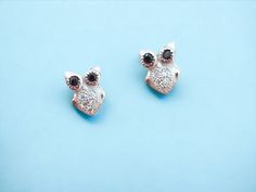 Sterling Silver Miniature owl ear studs, Small owl post earrings, Little owl earring studs, for her, gift ideas ⇒ MATERIALS Entirely made of .925 sterling silver  ⇒ PACKAGING All orders are carefully packaged in a lovely box ready for gift giving, and shipped in a bubble envelope. Please read all my shop policies before purchasing: https://www.etsy.com/shop/turinn#policies Go back to my Shop: https://www.etsy.com/shop/Turinn These charming tiny owl stud earrings are meticulously crafted from the Owl Ears, Owl Post, Owl Earrings Studs, Silver Packaging, Small Owl, Owl Earrings, Earring Studs, Ear Studs, Shop Policies