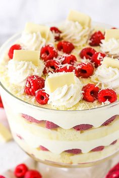 a trifle with raspberries and whipped cream