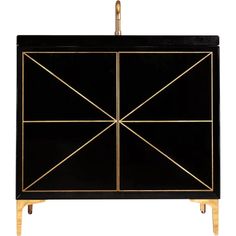 a black and gold cabinet with geometric design