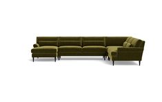 a green sectional couch with black legs and footrests on an isolated white background