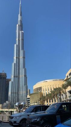 the tallest building in the world, burj seen from across the parking lot