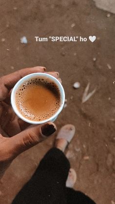 a person holding a cup of coffee in their hand with the caption tum special ho