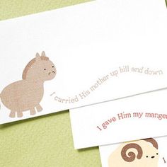 two envelopes with animals on them sitting next to each other