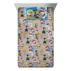 the paw patrol bedding set is in grey and has cartoon characters all over it