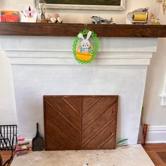 a fireplace with an easter decoration on the mantle