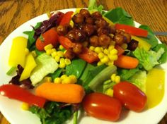 a white plate topped with lots of vegetables