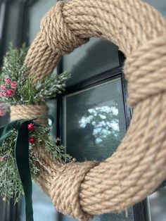 a wreath is hanging on the front door