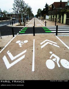 an image of a bike lane painted on the ground in paris, france with bicycles and bicycle lanes