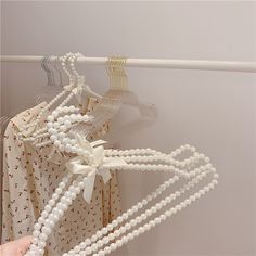 there is a rack with pearls on it