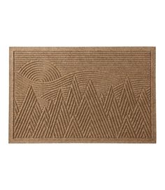 a door mat with mountains on it