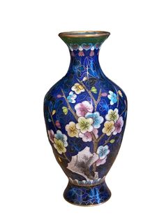 a blue vase with flowers painted on it