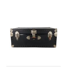 an old black trunk with metal handles and rivets on the sides, isolated against a white background