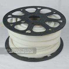 a spool of white electrical wire on a white background