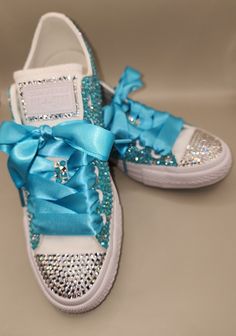 Custom Designed Brand New Women's Low Top Turquoise Bling Classic Converse Sneakers. Each pair are custom made per order. You can choose the color sneakers, rhinestones, and satin shoe laces that you want. Luxury Low-top Custom Sneakers With Bling, Blue Low-top Custom Sneakers With Studded Outsoles, Teal Bling Converse, Bedazzled Low-top Synthetic Sneakers, Turquoise Converse, Bling Sneakers, Classic Converse, Tie Sneakers, Satin Shoes