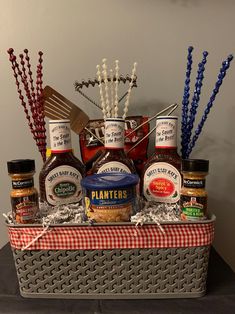 a basket filled with condiments sitting on top of a table