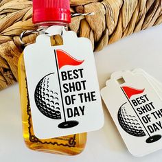 the best shot of the day bottle tag is next to a basket with golf balls on it