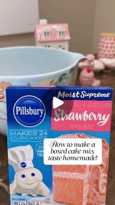 a box of pillsbury strawberry cake mix next to a bowl of marshmallows