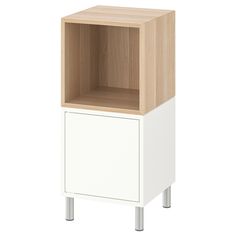 a white cabinet with a wooden shelf on top