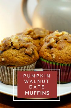 pumpkin walnut date muffins on a white plate