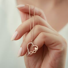 "Title: Heart Infinity Necklace, Minimal Heart Necklace, Valentines Necklace. * Material : Sterling Silver 925. * Finish: 925 Sterling Silver. * All jewelries that we sell are handmade. * This necklace is a great way to show your love and It will also look great with your outfits. * Our chain lengths are 16\", 17\", 18\" extender. * Our processing time is between 5 to 8 business days. It depends on pick seasons and busyness. IMPORTANT: **Please don't forget to customize this item with materials( Infinity Heart Pendant, Infinity Jewelry For Valentine's Day Gift For Mom, Infinity-shaped Jewelry For Mom For Valentine's Day, Valentine's Day Infinity Jewelry Gift For Mom, Infinity Necklace For Mom On Valentine's Day, Sterling Silver Infinity Heart Necklace For Anniversary, Handmade Infinity Jewelry As A Gift, Handmade Infinity Jewelry Gift, Rose Gold Sterling Silver Jewelry With Heart Beads