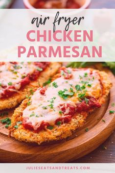 chicken parmesan on a wooden cutting board with text overlay that reads air fryer chicken parmesan