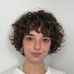 Stacked Haircuts For Curly Hair, Short Really Curly Hair, Curly Micro Bob, Nonbinary Hair Curly, Curly Micro Bangs, Nonbinary Hairstyles, Short Curly Shag Haircut, Curly Bowl Cut, Short Curly Shag With Bangs