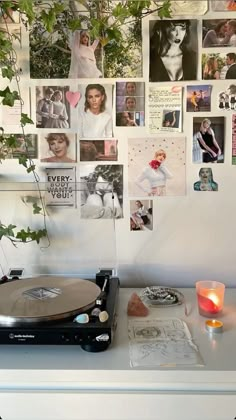 a record player sitting on top of a white table