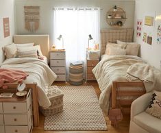 a bedroom with two twin beds and a rug