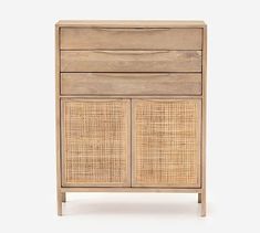 the sideboard is made out of wood and has rattan panels on it, along with an open drawer