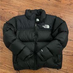 In Excellent Condition. Worn Only A Couple Times Color - Recycled Tnf Black Chest Waist Hips Arm Length L 39-41 In 32-34 In 41-43 In 33.3 In Fit: Relaxed, Hip-Length Silhouette / Interior Hem Shock Cord For Adjustability Warmth: 700-Fill Down Insulation For Premium Loft And Compression Sustainability: 100% Recycled Body, Lining And Overlay Fabrics Durability: Ripstop Fabric With Solid Taffeta Blocking For Abrasion Resistance Details: Attached Three-Piece Hood Packs Into Collar / Secure-Zip Hand Pockets / Jacket North Face Puffer Jacket Aesthetic, The North Face Black Puffer Jacket For Winter, Puffer Jacket Aesthetic, The North Face Black Hooded Puffer Jacket, The North Face Black Hooded Fleece Jacket, Northface Puffer, The North Face Black Long Sleeve Fleece Jacket, North Face Puffer Jacket, The North Face Windproof Long-sleeve Outerwear