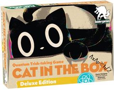 an advertisement for the cat in the box game, featuring a black cat with big eyes