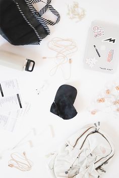 various items are laid out on a white surface