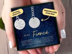 a woman holding two personalized star map pendants in her hands with the words to my france written on them